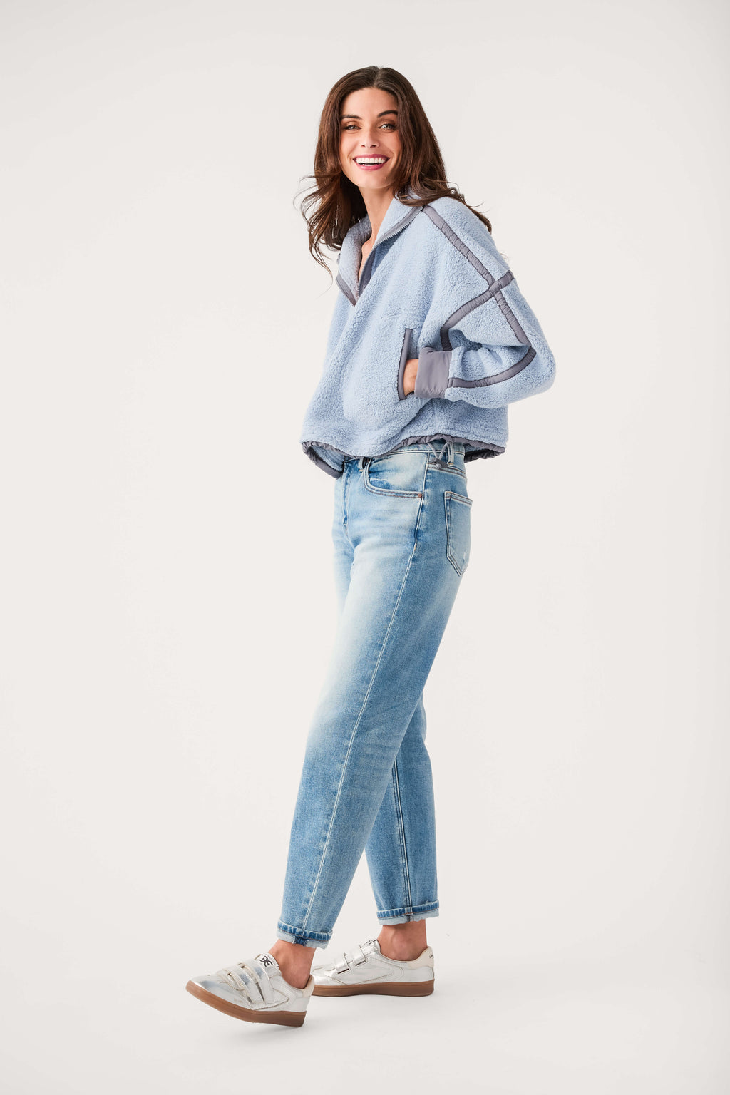 Light blue fleece 1/2-zip pullover with gray contrast trim and relaxed fit