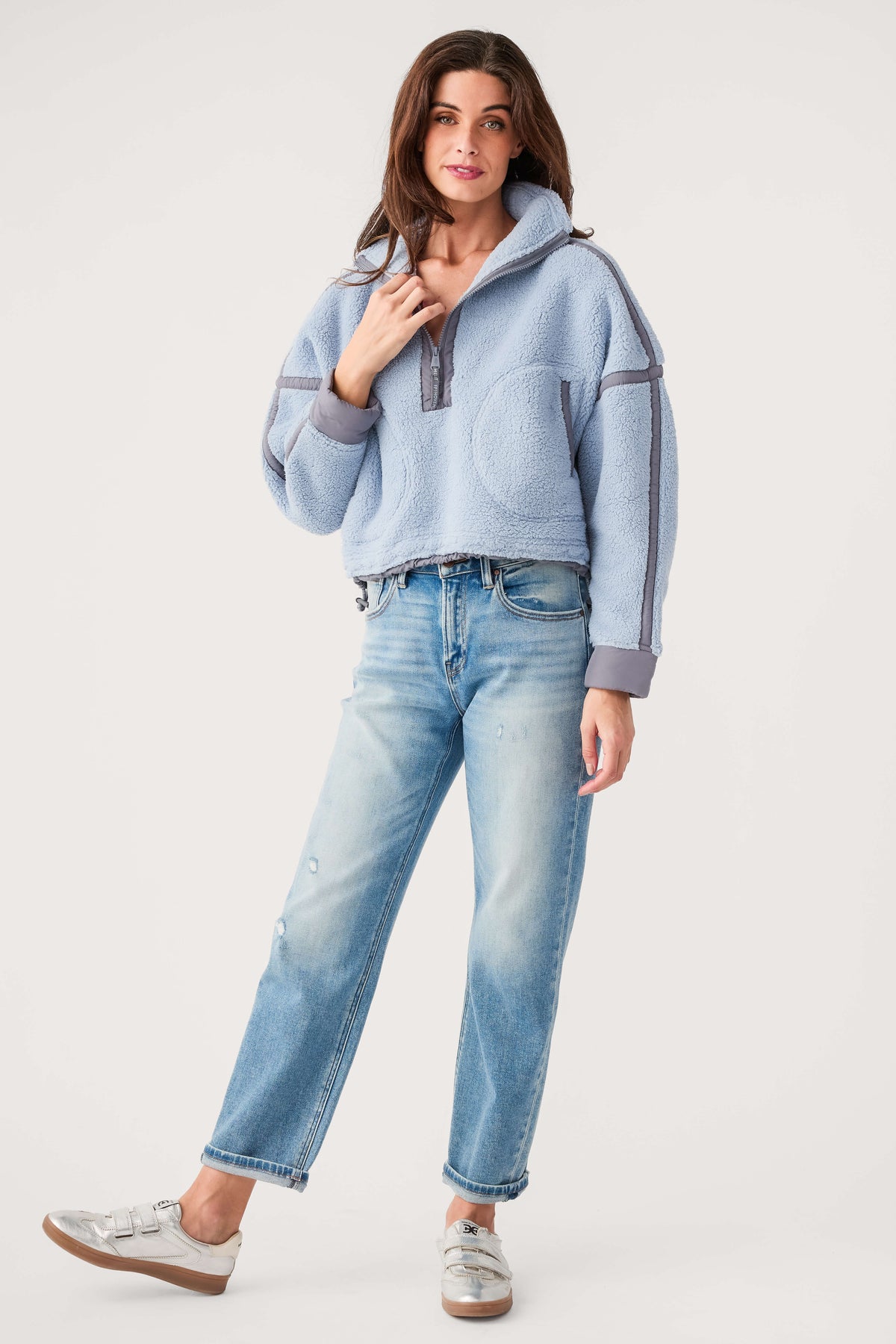 Light blue fleece 1/2-zip pullover with half-front zip and gray contrast trim