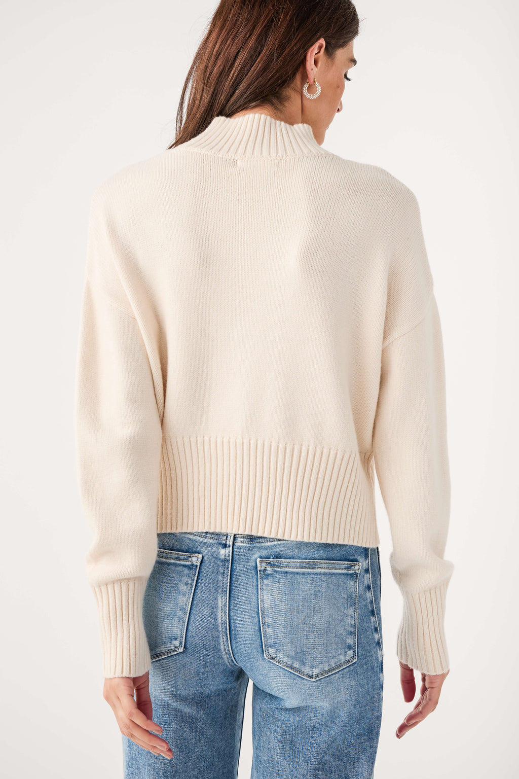 Ivory mock neck sweater, back view with ribbed hem and cuffs