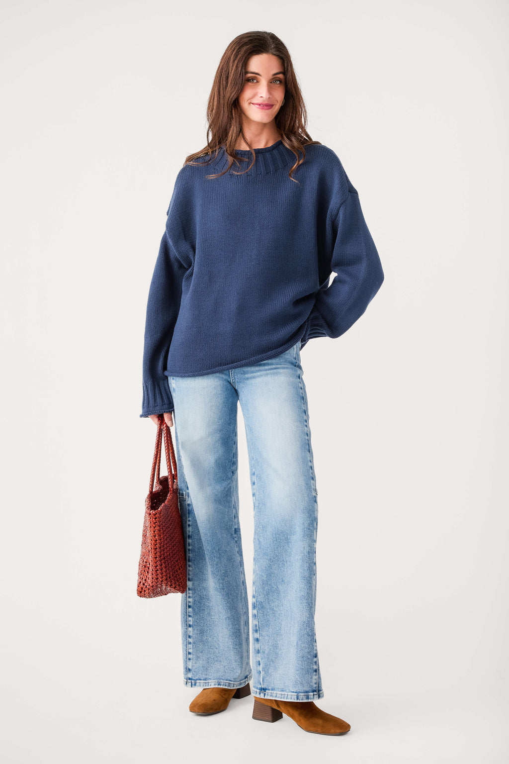 Navy mock neck knit sweater with ribbed collar and cuffs, relaxed fit