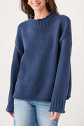 Navy mock neck knit sweater with ribbed neckline and long sleeves