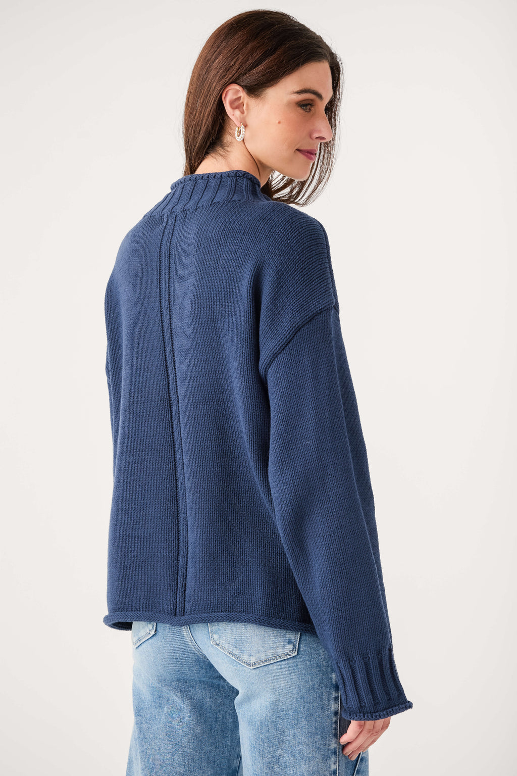 Navy mock neck sweater back view with ribbed cuffs and hem