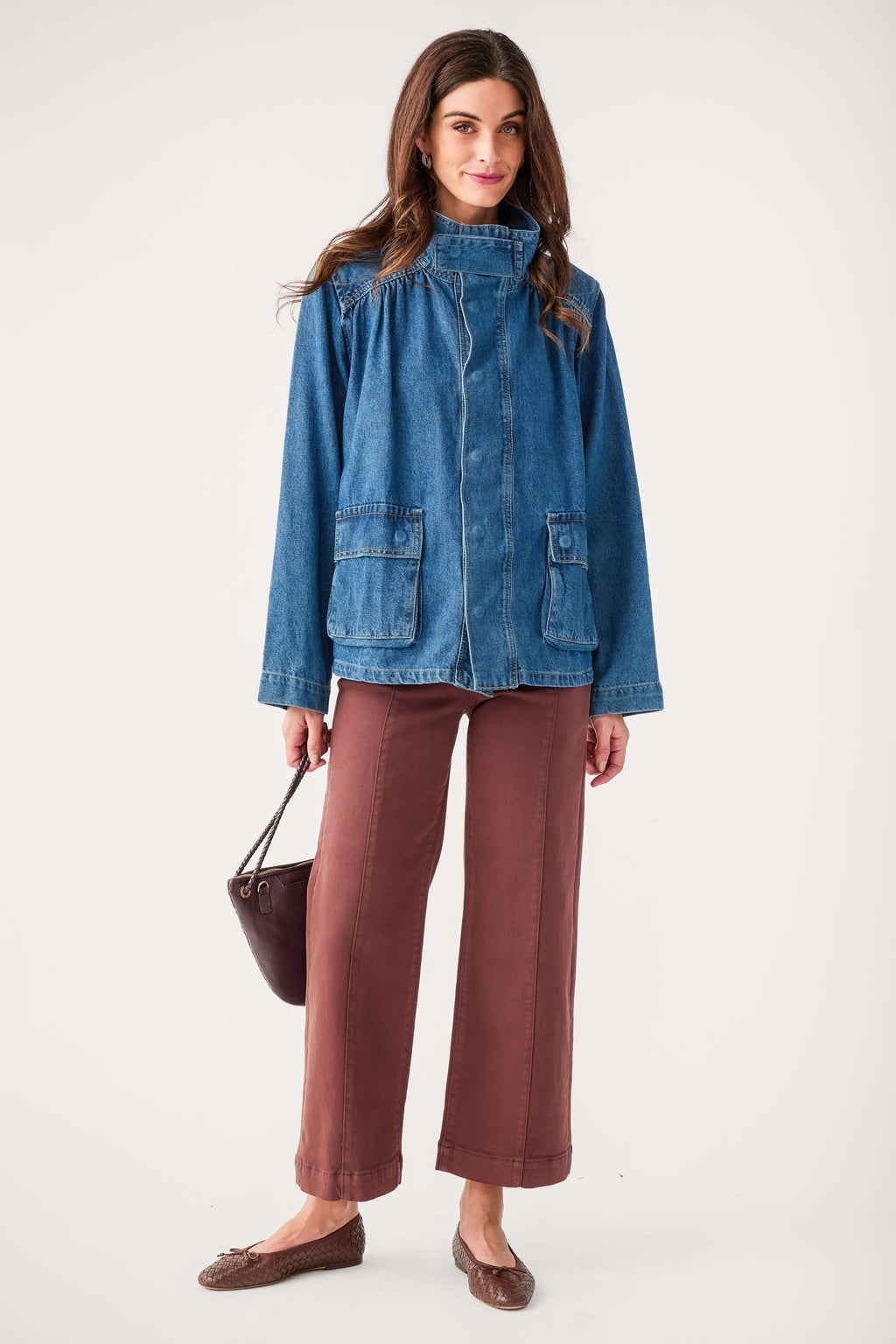 Oversized dark blue denim jacket with button-front and patch pockets