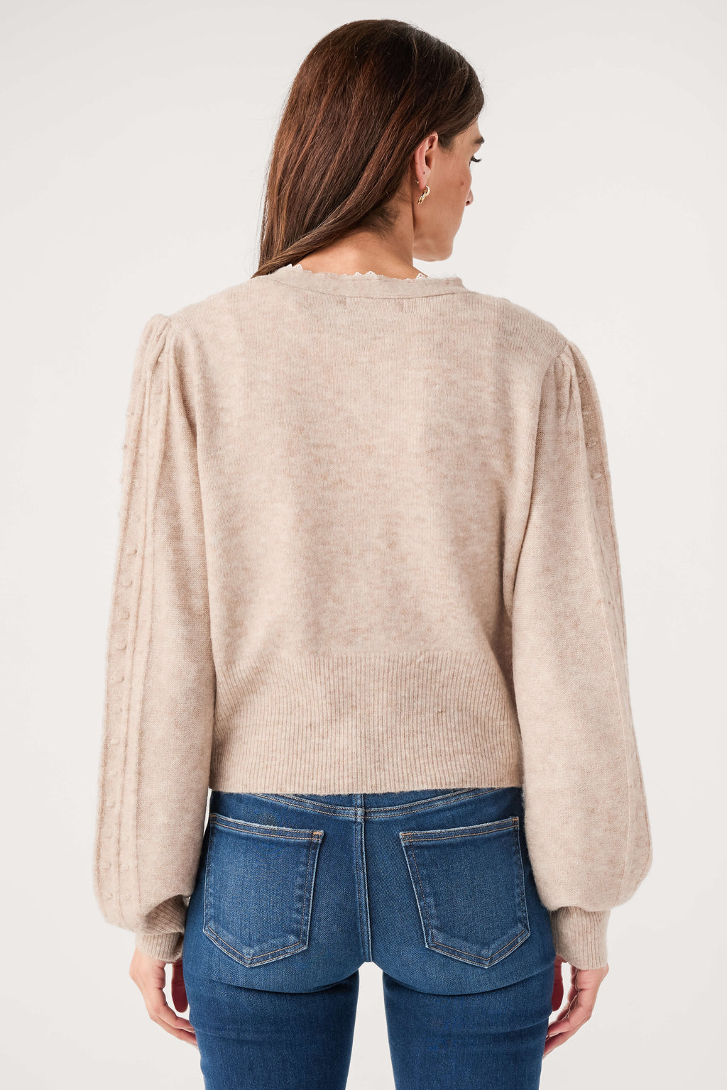 Mocha knit cardigan back view, long sleeves and rounded hem