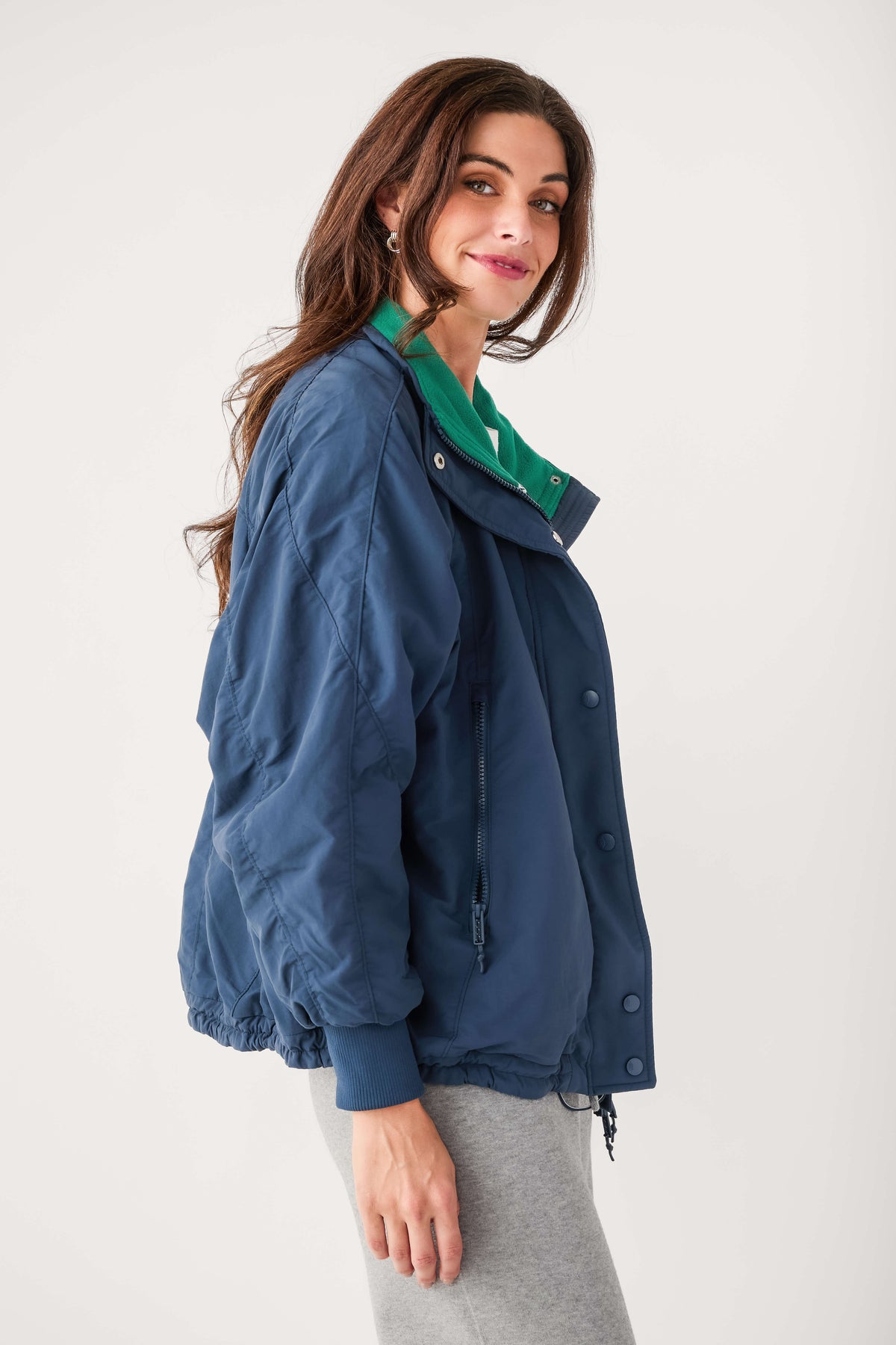 Midnight navy field jacket with green inner collar and button front placket