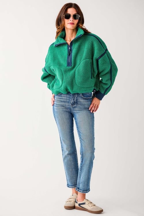 Green 1/2 zip fleece pullover with dark trim panels and side pocket