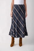 Navy plaid A-line skirt with cream and tan diamond pattern, midi length.