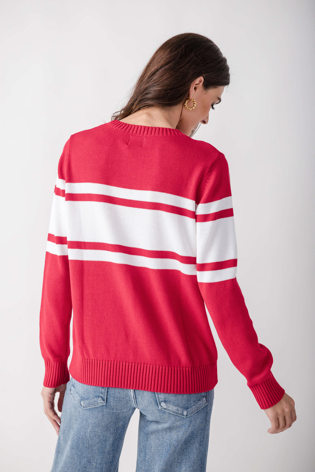 Red and white striped crew neck sweater with horizontal color-block stripes across the chest and sleeves.
