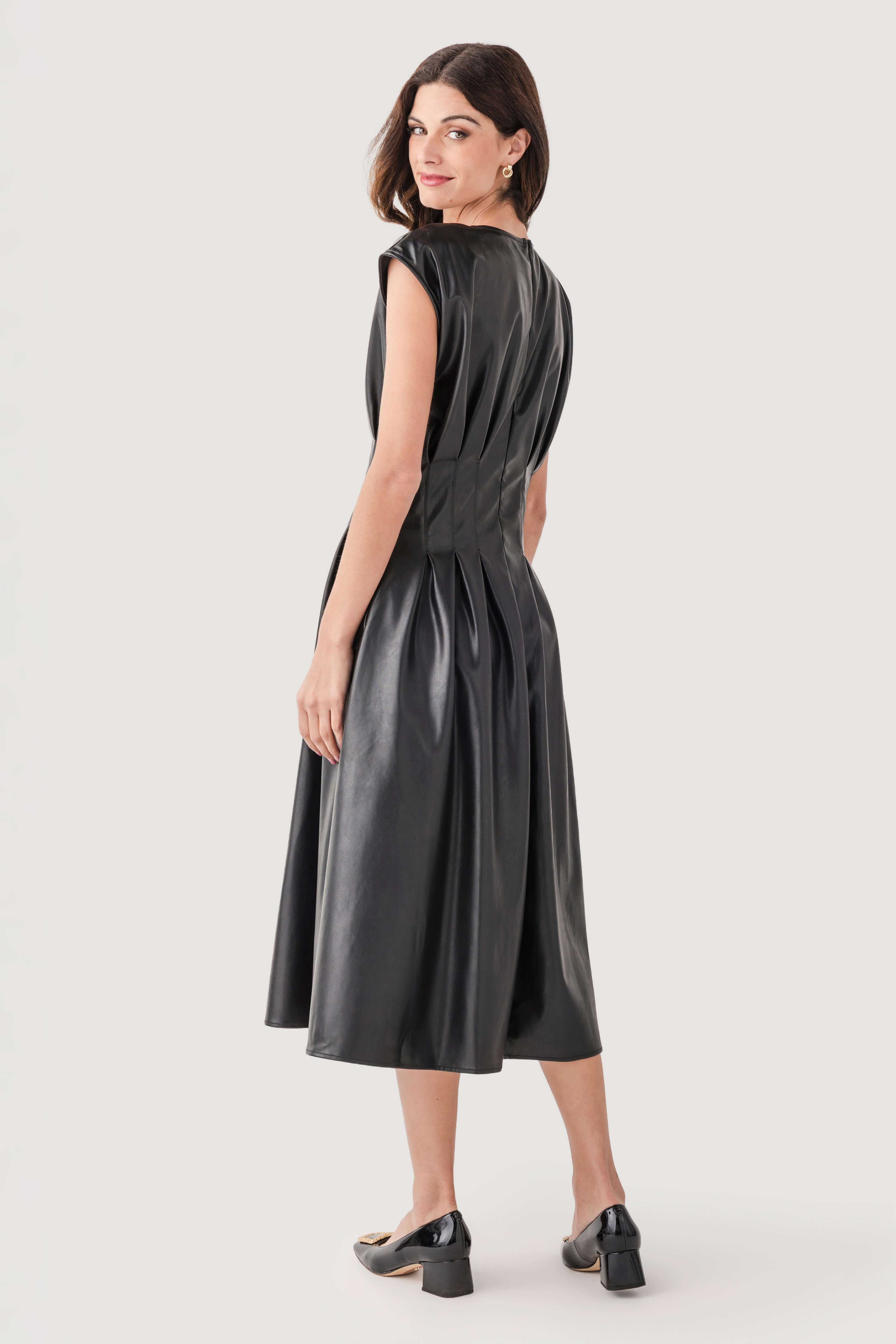 midi dress leather Faux Scoop Neck Seamed Sheath Featuring a faux leather material Vegan Leather Puff-Sleeve Zip-Front Midi