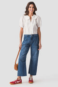 White short puff-sleeve blouse with Peter Pan collar, full front view