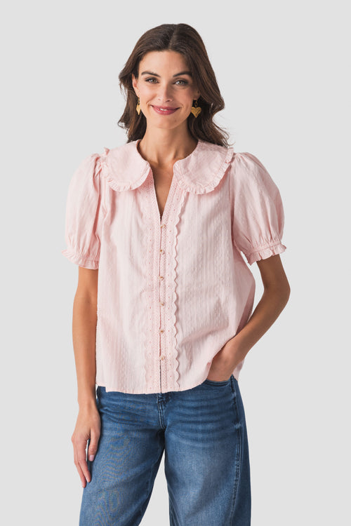 Light pink Peter Pan collar blouse with puff sleeves and button front
