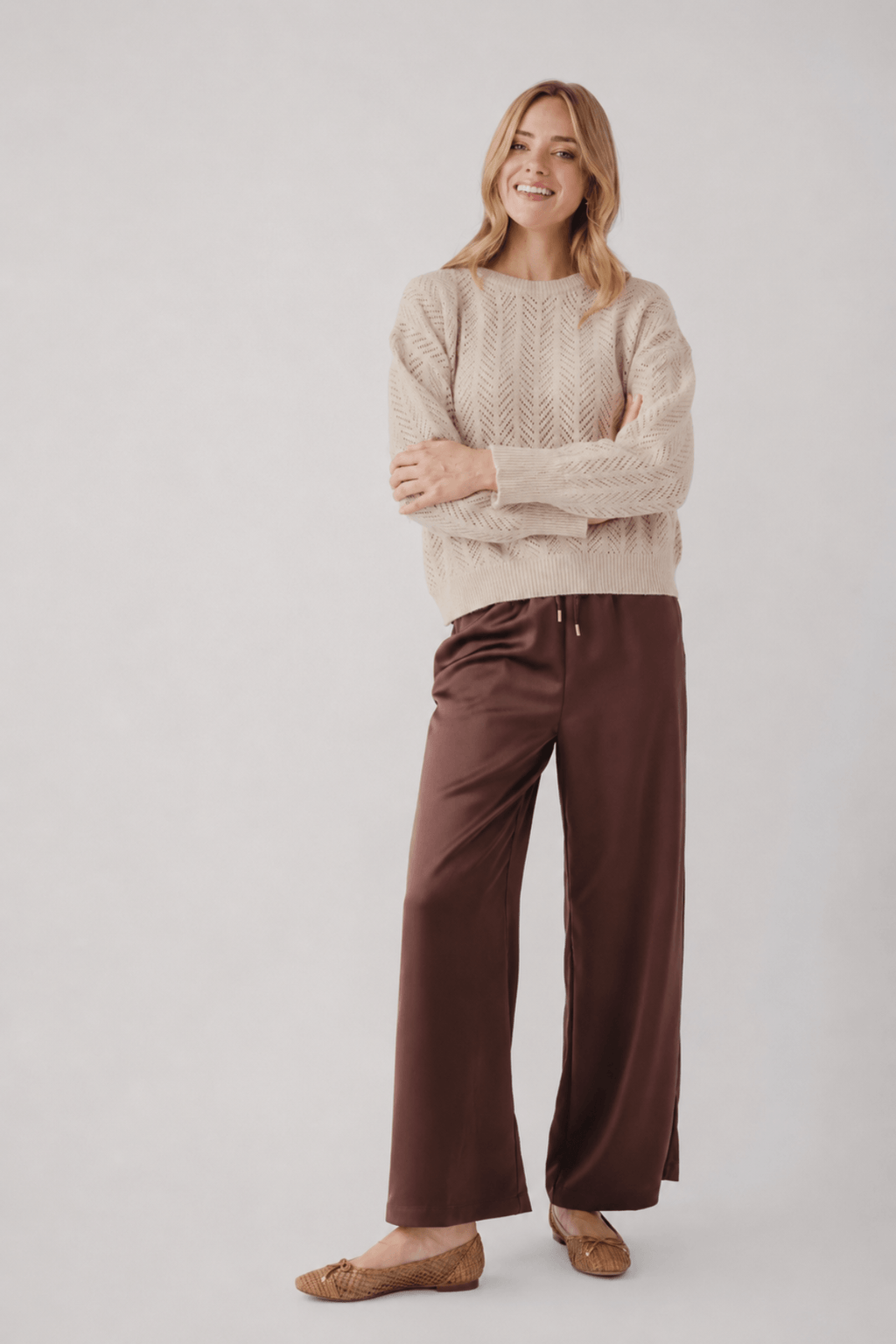 Espresso satin wide-leg pants with relaxed waist and flowing drape